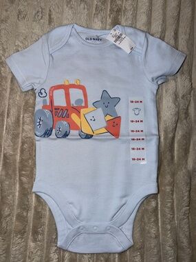 Old Navy Light Blue Onesie with Red Tractor & Colorful Shapes